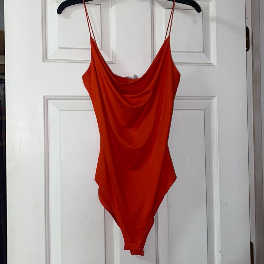 Red bodysuit. Size small. Never worn! Nwt